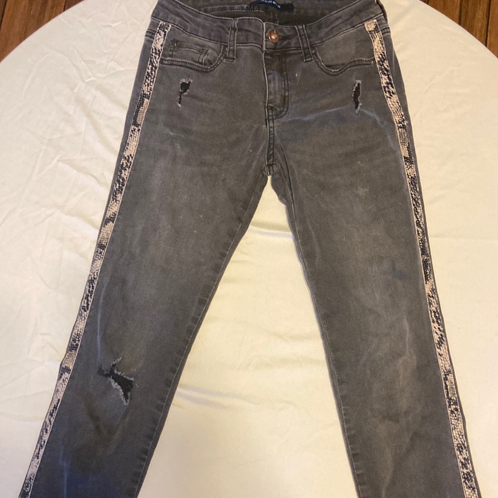 Black jeans with snake skin
